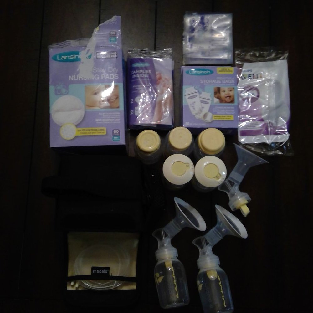 Medela pump in style advanced breastpump + extras